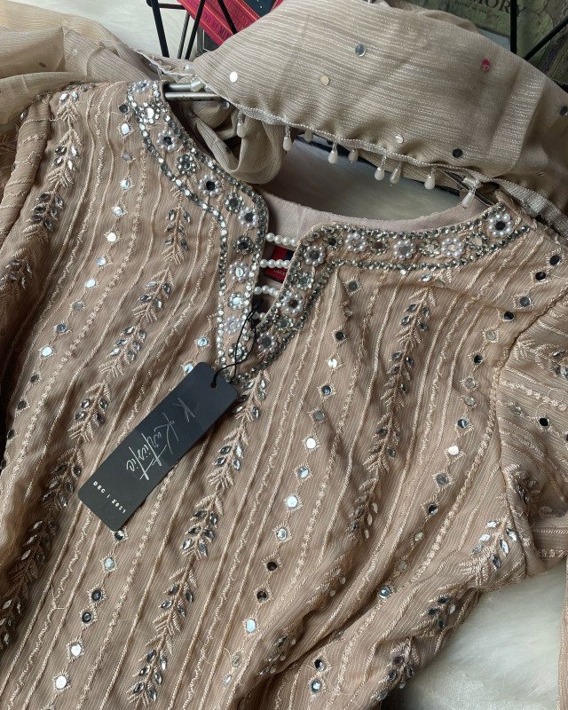 Kurtiistic gorgeous heavy emboidery & stone work three [ieces suite.